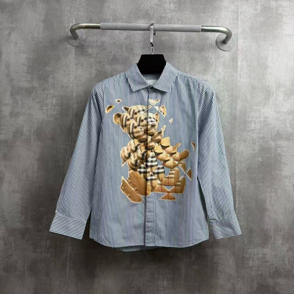 ❌sold❌Authentic Burberry Blue Striped Shirt with Bear Graphic